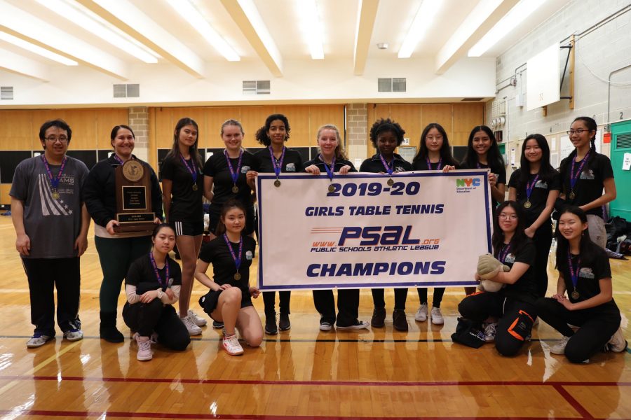 The Bronx Science Girls’ Varsity Table Tennis team has gone undefeated for two years in a row. From left to right (top): Bronx Science alumnus and volunteer coach Michael Song, coach Ms. Sisilli, Kristina Lian ’22, Lara Belton ’21, Joy Herrera ’20, Emery John ’20, manager Juliet Fleischer ’20, Xinrui Ge ’22, Chloe Guerrero ’22,  Valerie Ng ’22, Kaitlyn Lai ’22.
(bottom): Beryl Sin ’21, Gina Seo ’22, Jasmine Lo ’21, Emily Shang ’22