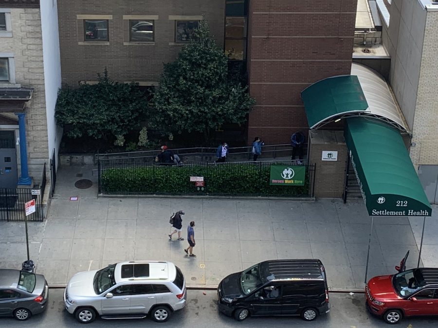 During the Coronavirus pandemic, people line up six fee apart, maintaining recommended social distancing guidelines, in order to receive medical treatment at a medical clinic in New York City. 