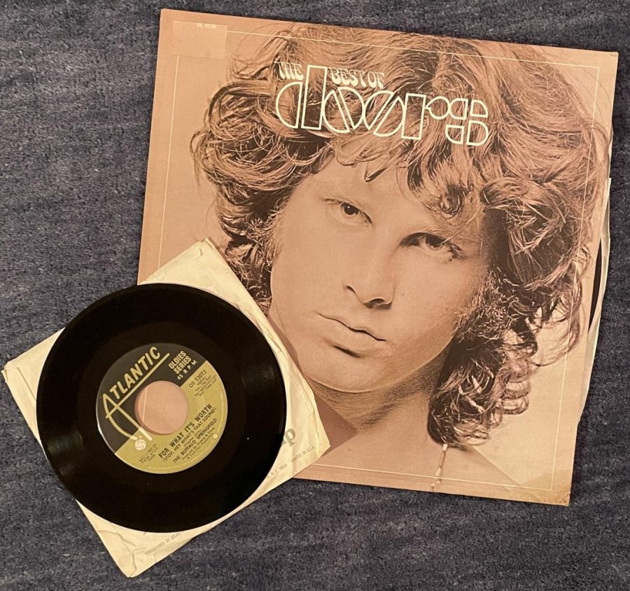 The author is particularly proud of this original 1973 pressing of "The Best of The Doors" which she purchased while walking down Columbus Avenue, and this Buffalo Springfield 45 pressing of their hit song 'For What It's Worth.'