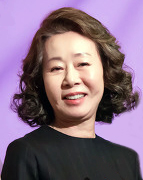 Here is a photograph of Youn Yuh-Jung, taken at the 2016 'Women In Film Korea Festival.'