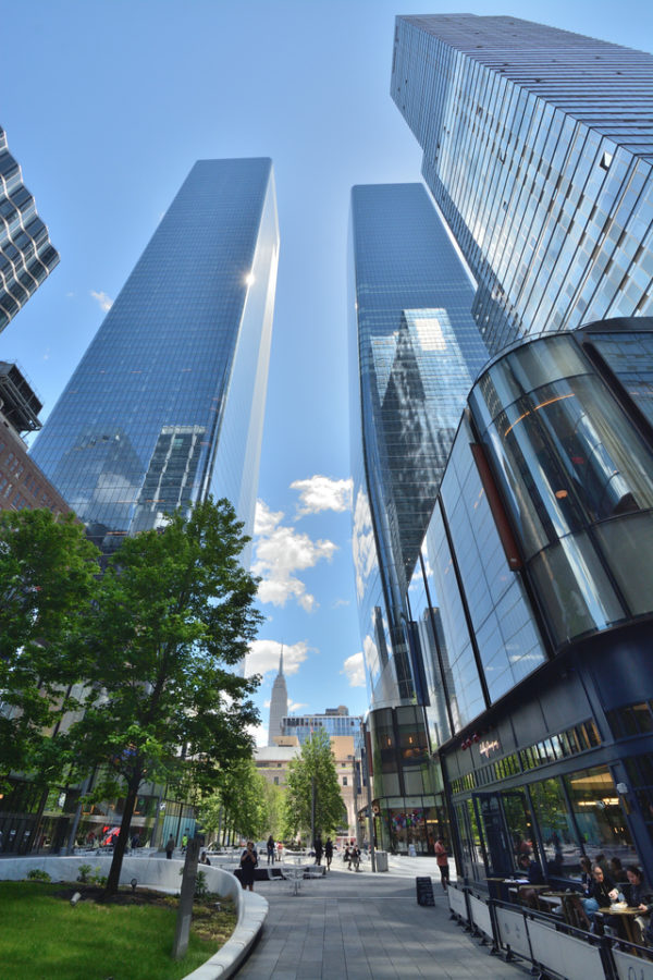 One Manhattan West (the left tower) and Two Manhattan West (the right tower) rise over the central plaza, their brilliant blue glass a visible sight from all over the city. “Ten years ago, there was nothing there. Now you cannot tell the difference at all if you look from the street at a normal set of buildings constructed from the ground,” said structural engineer Lulu Shen.
