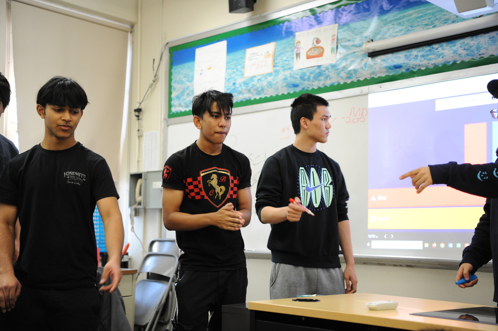 Board members of the Health and Fitness club discuss their presentation and allow for an interactive classroom experience. 