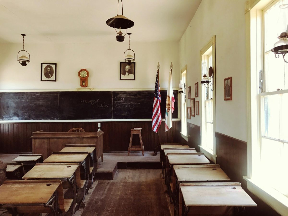 America’s government is growing more conservative, and this shift is bringing a resurgence of Christianity nationalism in America. Classrooms across the country, particularly in the South, are now seeing a push for religious curriculums in public schools, bringing with it an onslaught of debate around the subject. (Photo Credit: Nicola Tolin / Unsplash)
