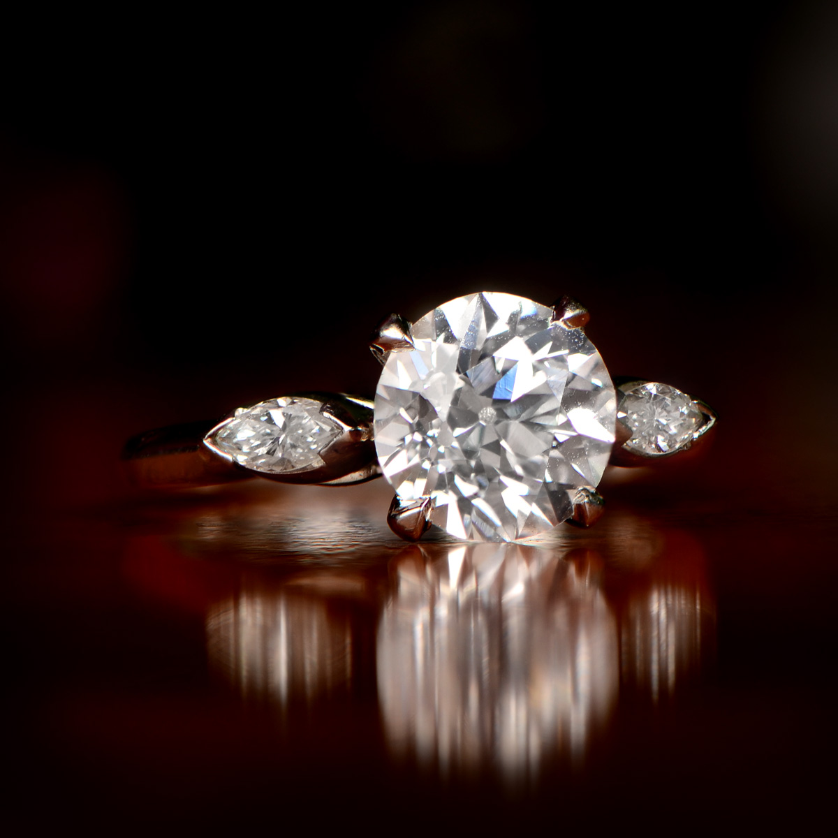 Pictured is a vintage, D-color grade circular diamond set in platinum. D indicates a colorless diamond, while letters further along the alphabet indicate diamonds that become progressively more yellow. (Photo Credit: CatherineLewis1976, CC BY-SA 4.0 , via Wikimedia Commons)
