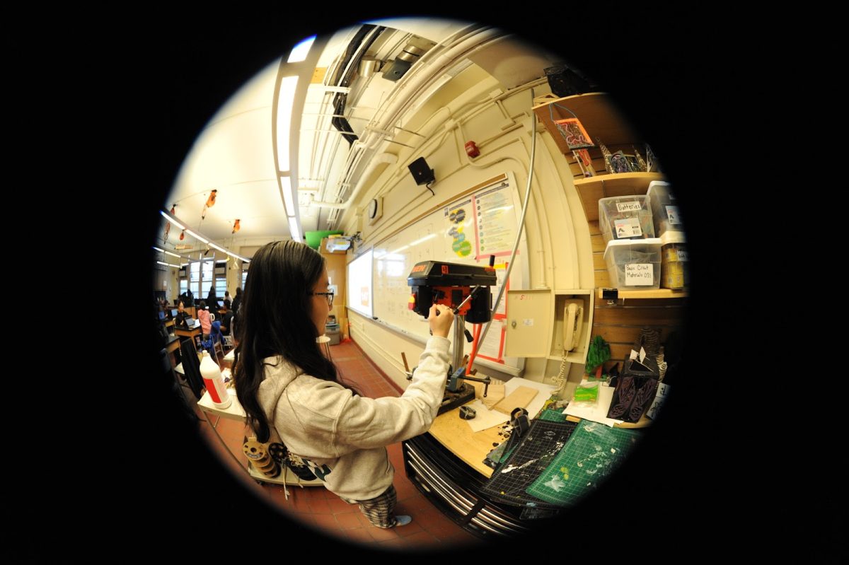 A student conducts hands-on experiments in a Bronx Science engineering course.

