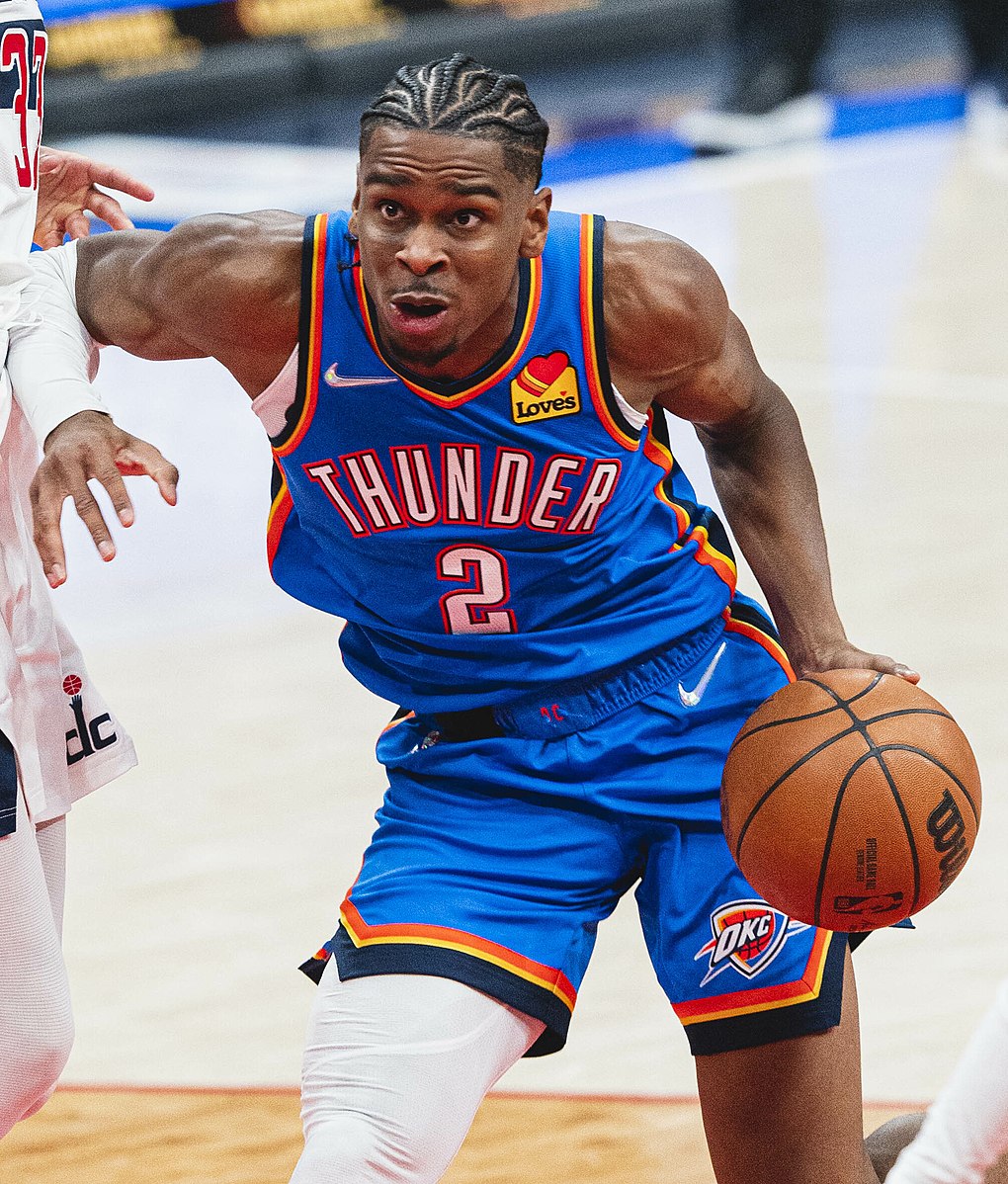 Here, Shai Gilgeous-Alexander uses his silky smooth moves to get an advantage on the defender and beat him to the basket. (Photo Credit: All-Pro Reels, CC BY-SA 2.0 , via Wikimedia Commons)